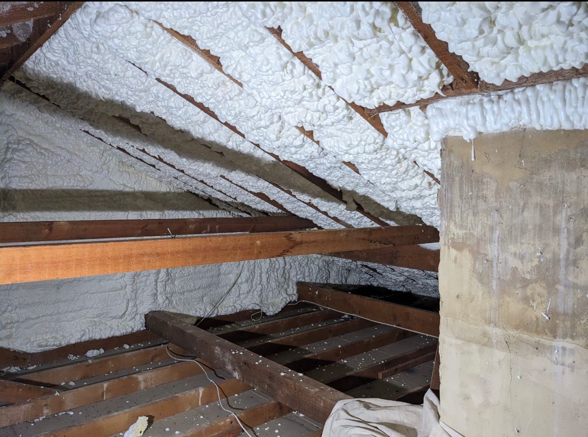 Small crawl space attic spray foam removal before and after. – before