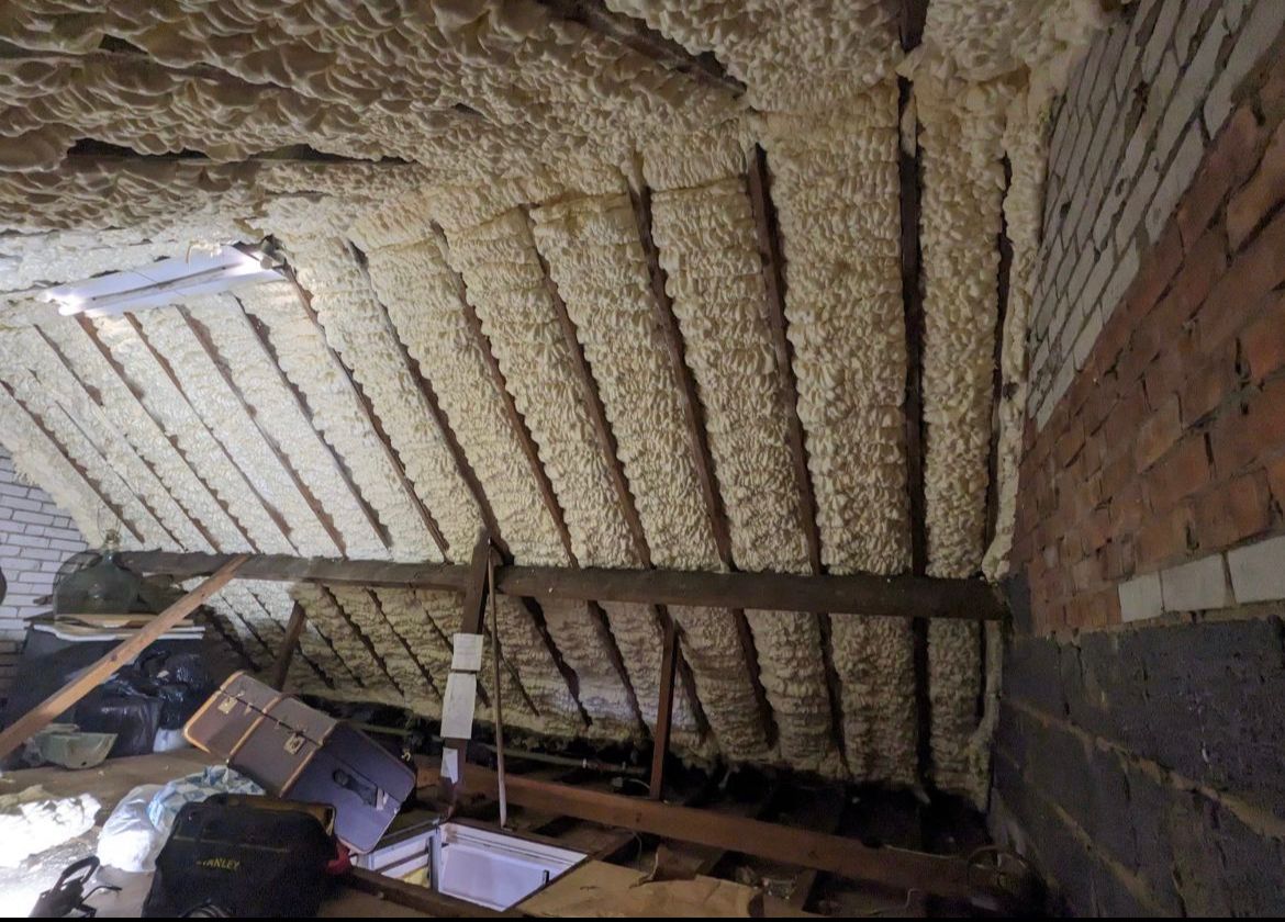 Large Area of Spray Foam Removed whilst maintaining the Roof Felt – before